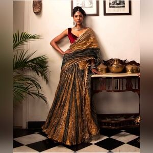 Elegant Gold and Black Saree